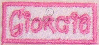 Patch ricamata su tessuto.
